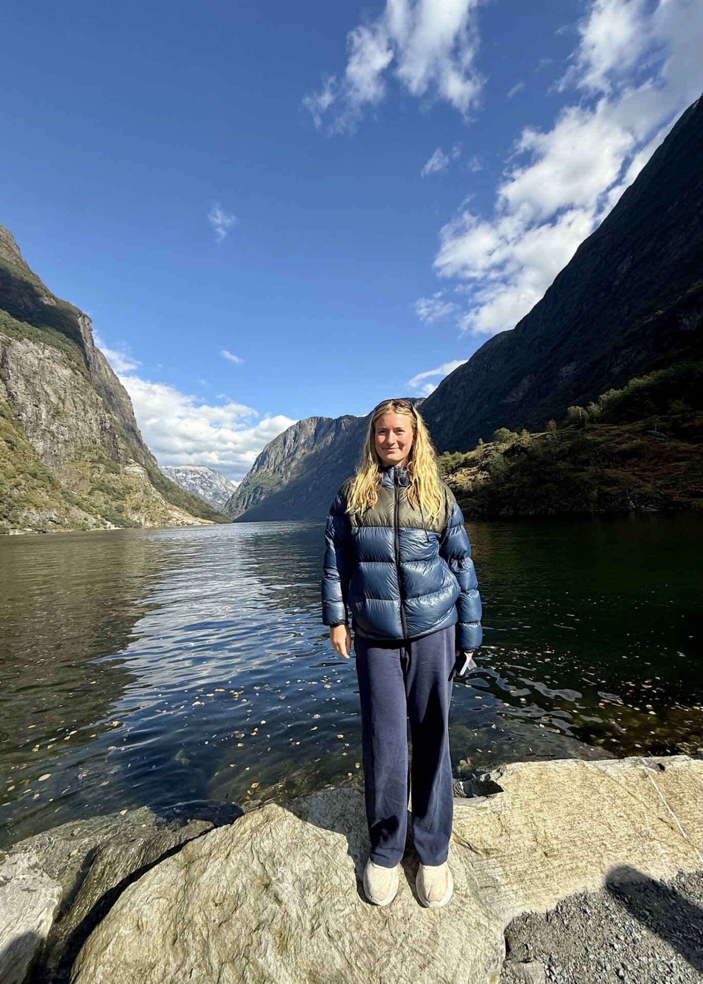 Lily standing in front of lake